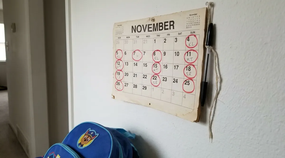 Wall calendar with overnights circled in red marker to count court-ordered parenting time